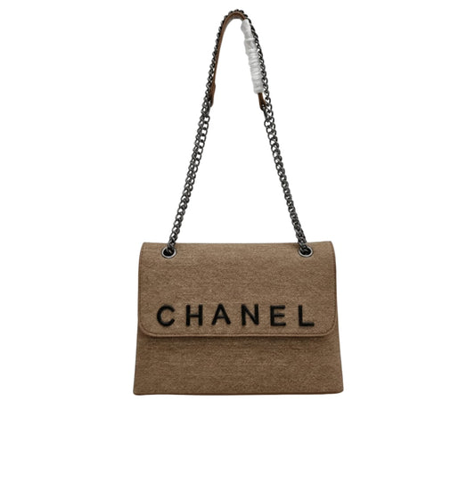 Chanel | Timeless/classic Flap Bag In Beige Jersey Material.